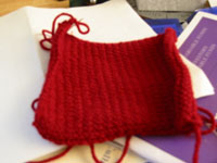 first step, a knitted square