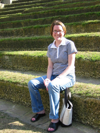 Sitting in the seats of the Arneson River Theater, on the River Walk.  The weather was terrific, but my allergies were definitely not.